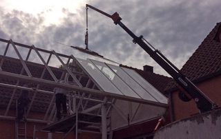 placement toiture en verre avec grue